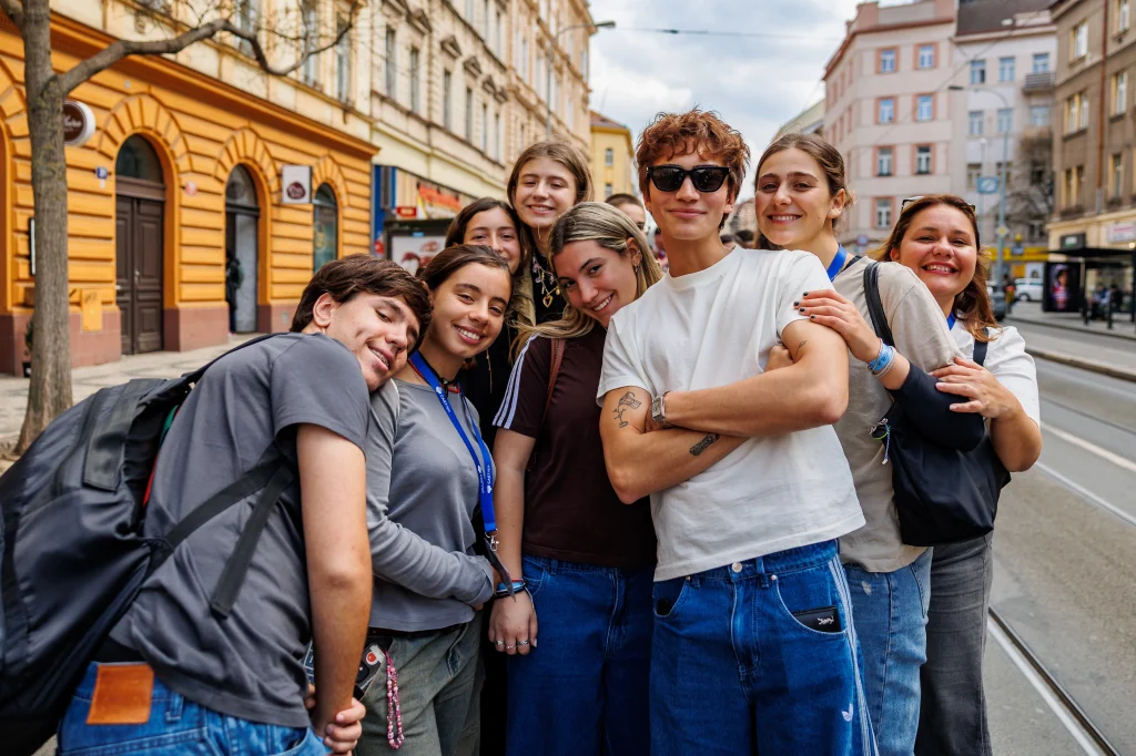 Students posing in the streets of prague during Prague Spring